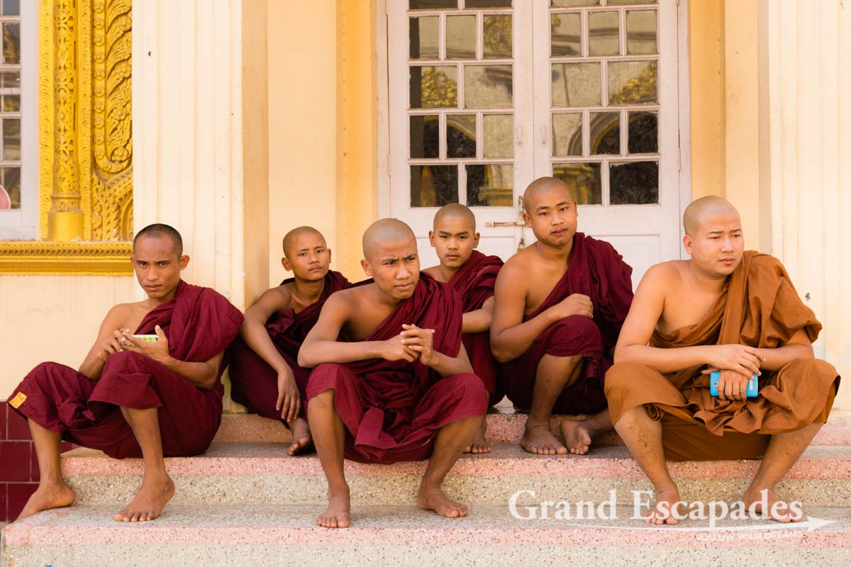 Monks sitting and resting, Mahamuni Paya, Mandalay, Myanmar